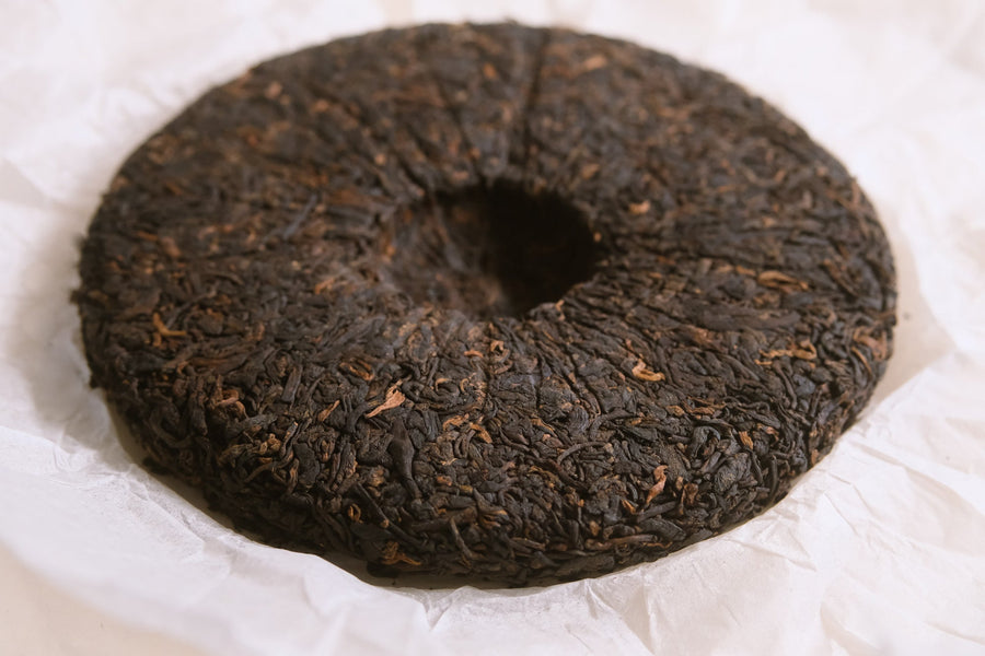 Huazhuliangzi Pu'er Shupu, ripe and aged, from Menghai in Yunnan, China, detail of the press cake