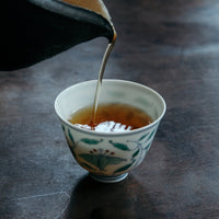 Shuixian rock tea wulong from Wuyishan, China, Banyan premium area yancha, infused in antique Chinese cup teaware
