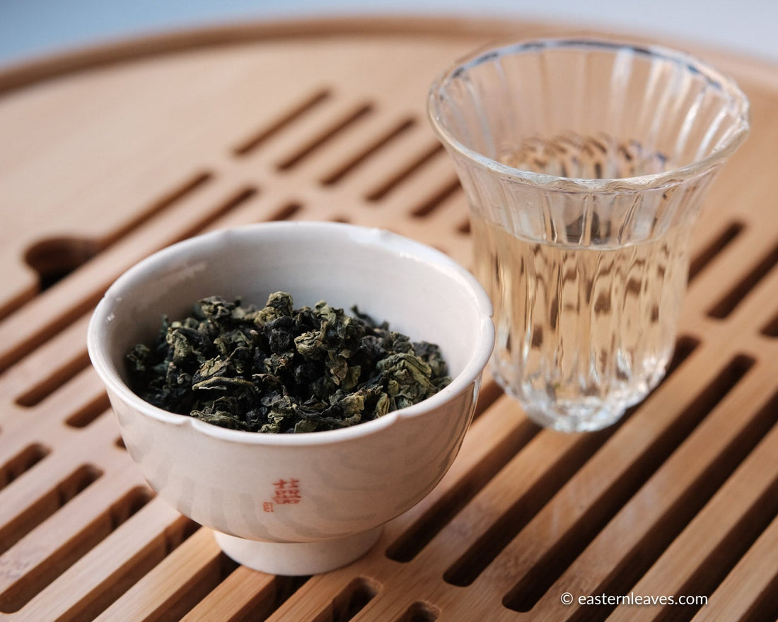 Tieguanyin wulong tea low roasted flowery in glass cup teaware, from China, Fujian, loose leaf premium tea