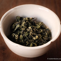 Tieguanyin wulong tea low roasted flowery in glass cup teaware, from China, Fujian, loose leaf premium tea