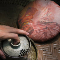 pu'er tea pressed in brick cake from Nannuo mountain, Bama, Yunnan, Xishuangbanna, Chinese tea with gaiwan gongfucha