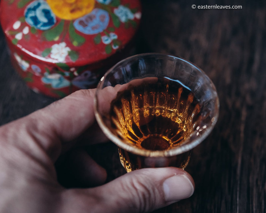 Ancha dark black tea, fermented, in original bamboo leaf basket; 2014 harvest from China