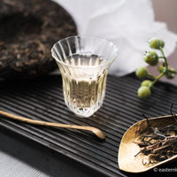 Pu'er shengpu blend in forest in pressed cake, from Yunnan, China, 2021 spring harvest vintage, Mangfei, Mannuo, Zhengkang