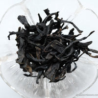 Dancong Yashixiang duck shit fragrance wulong tea from Guangdong China, served in glass cup teaware loose leaf