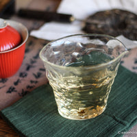 Pu'er shengpu blend in forest in pressed cake, from Yunnan, China, 2021 spring harvest vintage, Mangfei, Mannuo, Zhengkang