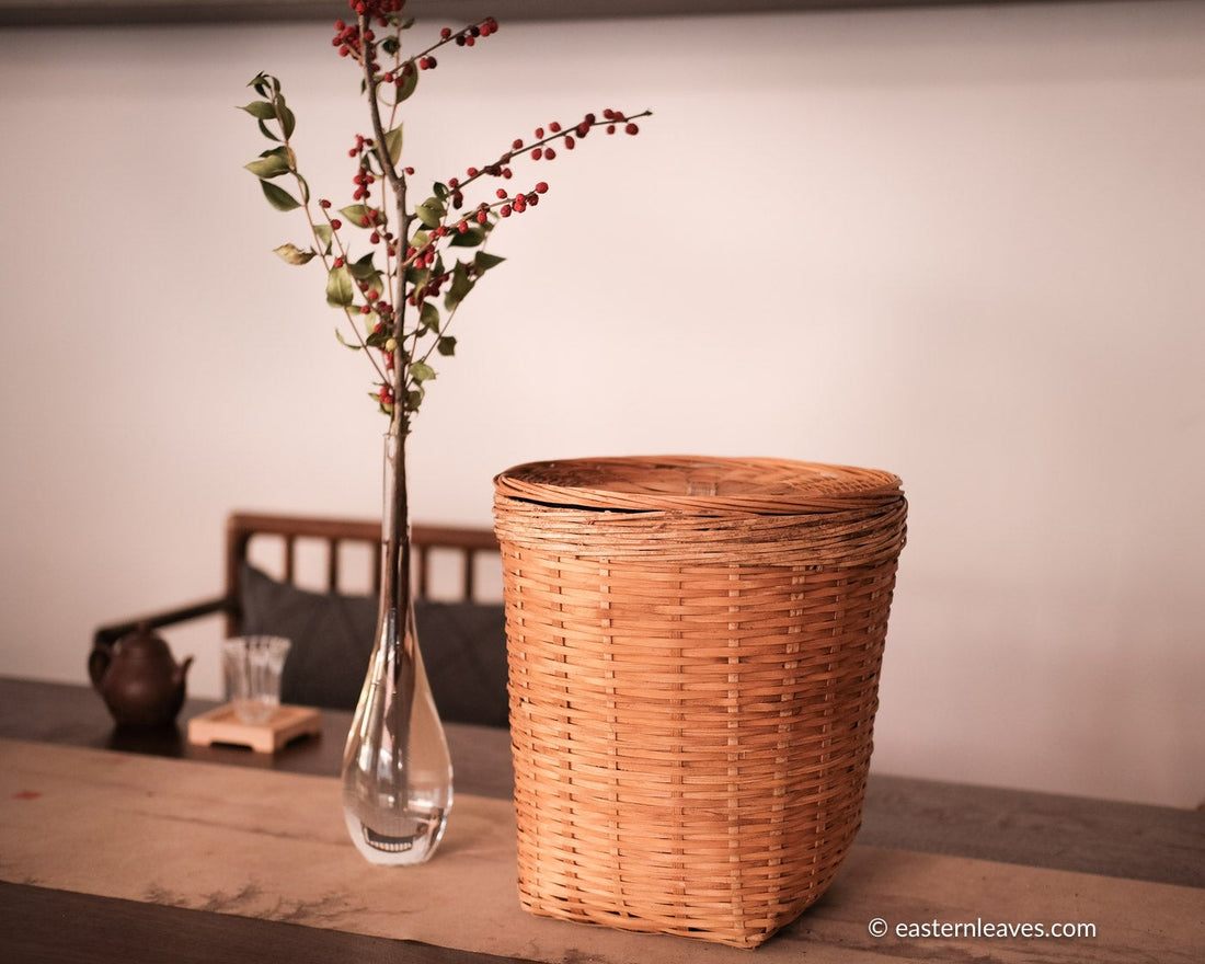 Liubao cha dark black tea, fermented, in original bamboo leaf basket; 2006 harvest from China