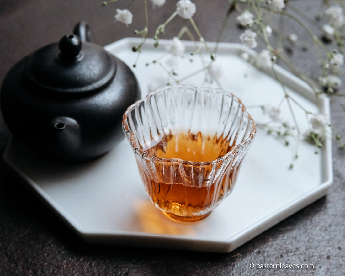 Liubao cha dark black tea, fermented, in original bamboo leaf basket; 2006 harvest from China