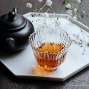 Liubao cha dark black tea, fermented, in original bamboo leaf basket; 2006 harvest from China