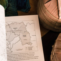 pure tea book "ancient caravan and urban chic", by Zhang Jinghong, tea book, pu'er area map with bamboo tong