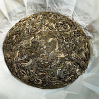 2025 Laoman'e Sheng Pu'er, Ancient Trees Stone - pressed cake - Eastern Leaves