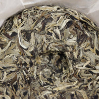 Chinese white tea Yueguangbai moonlight white tea, Lunan Pasha Yunnan, aged white tea in pressed tea cake brick, ancient trees gushu