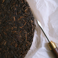 Huazhuliangzi Pu'er Shupu, ripe and aged, from Menghai in Yunnan, China, detail of the press cake