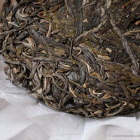 Laobanzhang  pu'er shengpu tea from ancient trees gushu, in Yunnan, China; stone pressed cake high quality tea