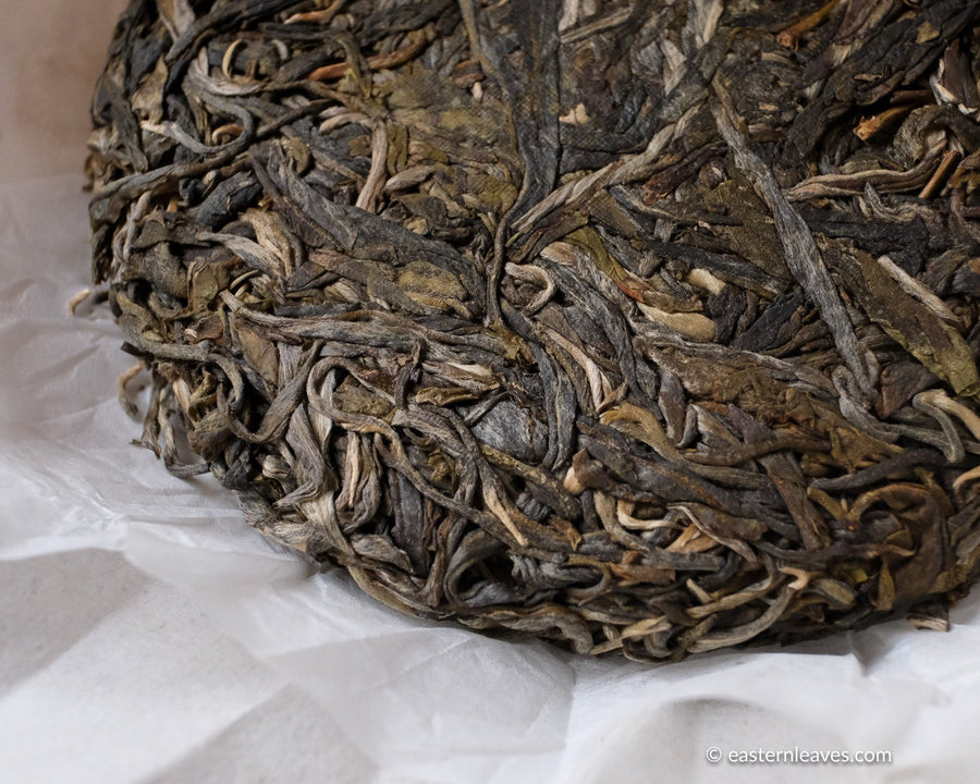 Laobanzhang  pu'er shengpu tea from ancient trees gushu, in Yunnan, China; stone pressed cake high quality tea