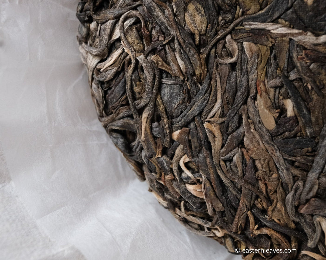 Laobanzhang  pu'er shengpu tea from ancient trees gushu, in Yunnan, China; stone pressed cake high quality tea