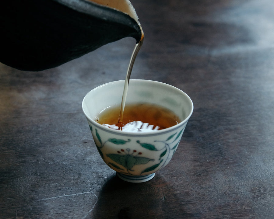 Shuixian rock tea wulong from Wuyishan, China, Banyan premium area yancha, infused in antique Chinese cup teaware