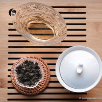 Tieguanyin wulong tea high roasted, baked, oxidation in glass cup teaware, from China, Fujian, premium tea