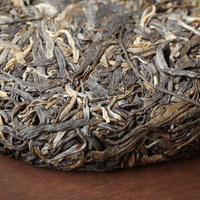 ancient trees pu'er shengpu from Lunan Pasha, Yunnan, China, pressed in brick by farmers, leaf detail