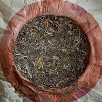 high quality pu'er tea pressed in brick cake from Nannuo mountain, Bama, Yunnan, Xishuangbanna, with details of the loose-leaf
