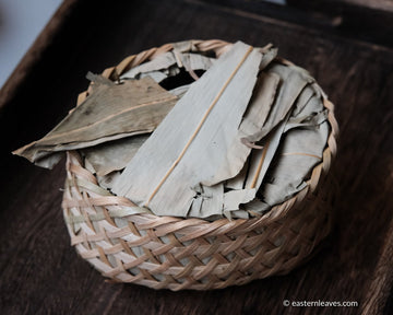 Ancha dark black tea, fermented, in original bamboo leaf basket; 2014 harvest from China