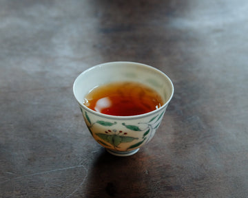 Dahongpao rock tea from Banyan premium area, Wuyi, Wuyishan, in China. Loose leaf wulong tea in antique Chinese cup