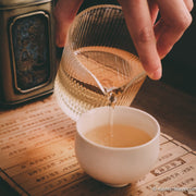 Dancong osmanthus Guihuaxiang wulong tea from Guangdong China, served in porcelain cup teaware