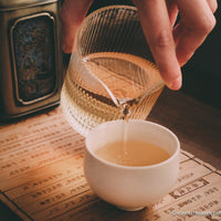 Dancong osmanthus Guihuaxiang wulong tea from Guangdong China, served in porcelain cup teaware