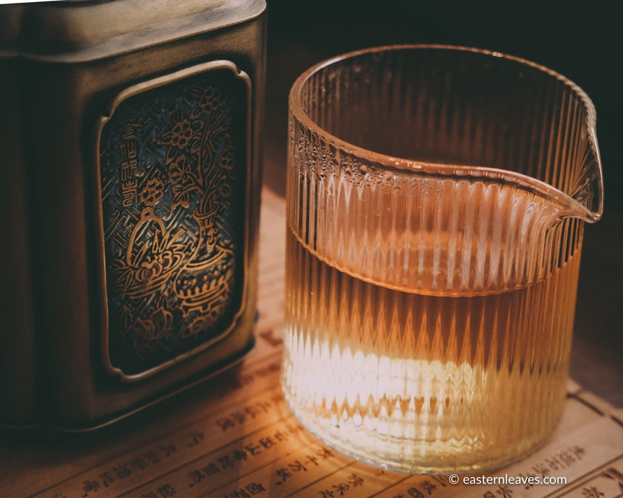 Dancong osmanthus Guihuaxiang wulong tea from Guangdong China, served in porcelain cup teaware, loose leaf premium tea