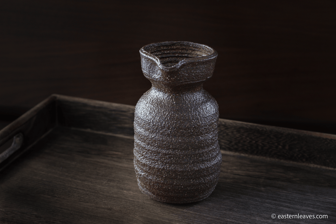 Dai minority Gongdaobei, tea pitcher, handcrafted in Yunnan, China - brown rough texture clay, 250ml, on wood